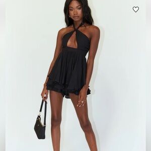 Princess Polly Veronica Romper in Black size 6. Low cut w/halter ties. Cute!